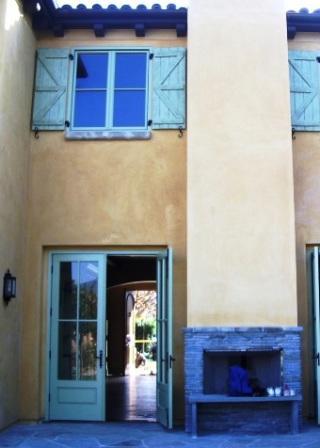 custom fireplace, limestone detail, doors