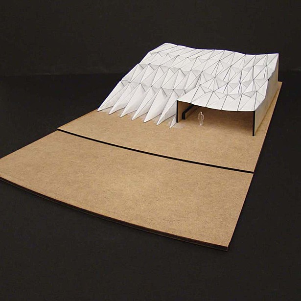 Testig the sturcture, a dynamic model of the dam's folding system.