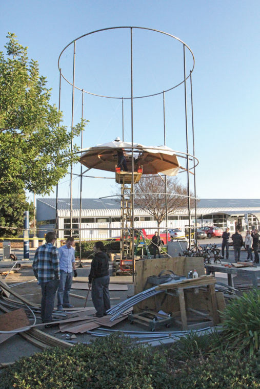 Architecture students construct, with funding from NASA, a vertical habitat facility. (Photo: Derek Eng/The Poly Post)