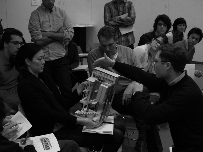 Tom discussing his proposal with critics Jennifer and Alan