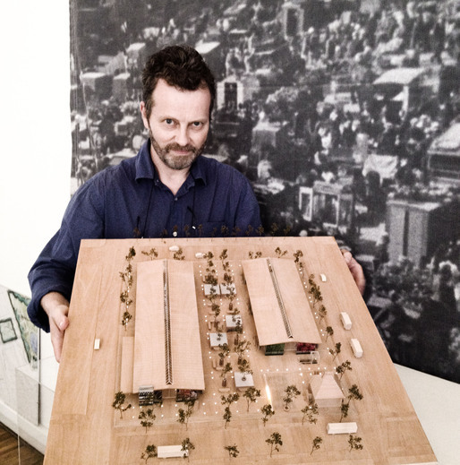 Architect Hans Peter Hagens with a model of Torvehallerne. Photo by Chris DeHenzel.