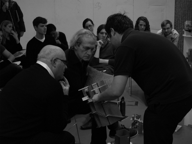 Joeb and Peter admire AJ's craft (while David lurks in the background)