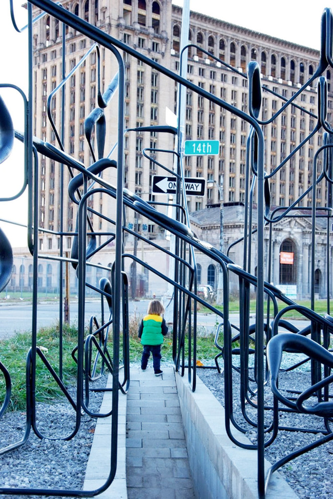 A toddler traverses the pavilion