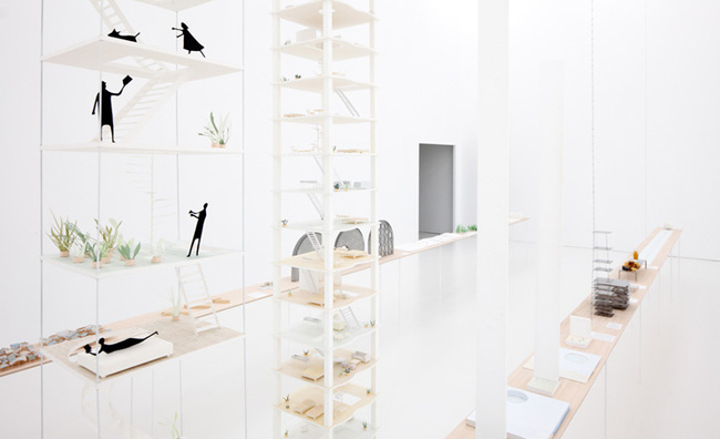 Positioned on 10 long tables, the dainty models - ranging from small-scale proposals, to realised work and even utopian landscapes - are on show in Europe for the very first time (Image via wallpaper.com)