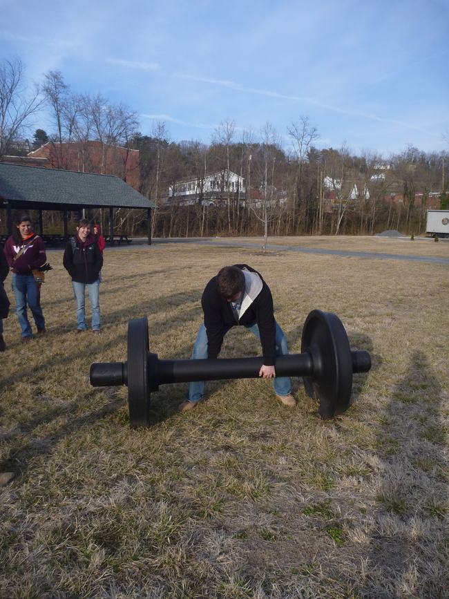 Stephen tries to show off his dead lifting skills