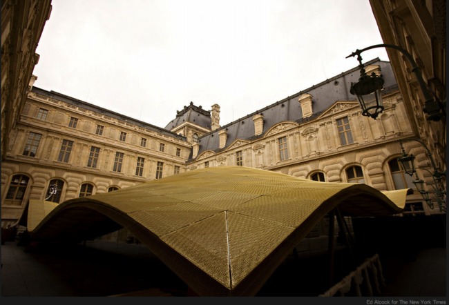 The Louvre's new “luminous veil,’’ or “flying carpet” as it has also been called, covers some 30,000 square feet of gallery space on the ground and lower floors via NYT
