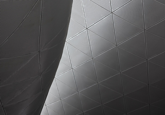 The bottom side is covered by double curved perforated aluminium sheets. (Photo: Kari Palsila)