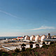 A present day image and future collage of the Hyperion Treatment Plant. The collage titled Hyperion Water Treatment Plant (1890-2061) - aka “The Toilet” is by Taalman Koch Architecture based in Los Angeles. Photograph by Noah Webb, collage by Taalman Koch Architects.