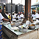 Jiko ya jamii (Community Cooker): Architects: James Howard Archer (England, born Kenya) and Mumo Musuva (Kenya), Planning Systems Services, Ltd. Technical support: Arup Cause, Chris Print, Noel Johnson. Funders: United Nations Environment Program, United Nations Development Program, Basco Paints, AON Insurance Company, SGS Management Systems, KenGen Electric Company. Laini Saba village in Kibera informal settlement, Nairobi, Kenya, 1993-present. Stone, iron sheets, wire mesh. Photo: ©...