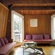 The third floor contains a sitting room with built-in sofas. Annie Schlechter