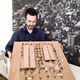 Architect Hans Peter Hagens with a model of Torvehallerne. Photo by Chris DeHenzel.