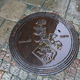 Malmö's crest on manhole cover