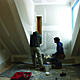 Students installing ventilation window
