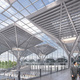 Filigree shade roofs in the entrance hall (Image: gmp · von Gerkan, Marg and Partners · Architects)