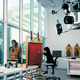 View of the conservation studio that overlooks and receives ample north light from the pocket of planting between the end of the internal promenade and the colonnade. From the latter, the public can catch a glimpse of this important museum function. (Photo: Hickey & Robertson)