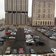 Current situation of Flint's central downtown parking lot: Mott Foundation building is on the right; Genesee Towers, on the left, is slated for demolition (Image courtesy of Flat Lot Competition)