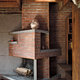 The third-floor sitting room’s angular brick fireplace. Annie Schlechter