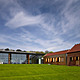 The rolling lawn with oak clad archive (Photo: Richard Bryant Photography)