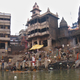 Manikarnika Ghat, her pile of charcoal, blackened temple and two eternal waiting rooms