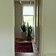 View from kitchen through bedroom window