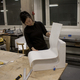 7. Jennifer Wong holding final uncut foam shell of Kari 3 chair