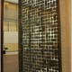 One of the thousand pound bronze and glass doors that open into the light court from the Collection Galleries. (MICHAEL BRYANT : Staff Photographer )