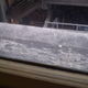 Decaying/rotting wooden beams/paneling on the exterior of window from the First Foyer... 