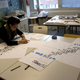3. Jennifer Wong taping sheets of 25mm contour section cuts of the Kari 3 chair