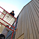 Students completing siding